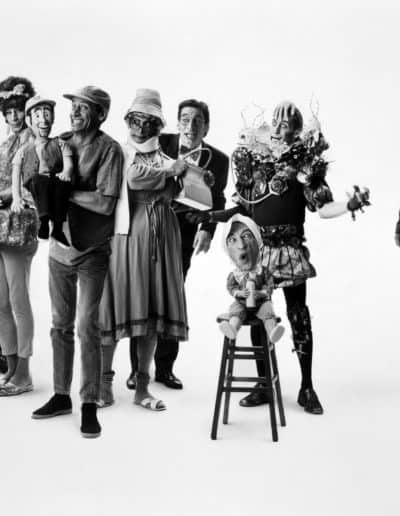 Jim Varney as the various characters of the Ernest series, L-R: Coy, Bunny Jeanette, Woody, Ernest P. Worrell, Auntie Nelda, Astor Clement, Baby Ernest, Dr. Otto, Pop.